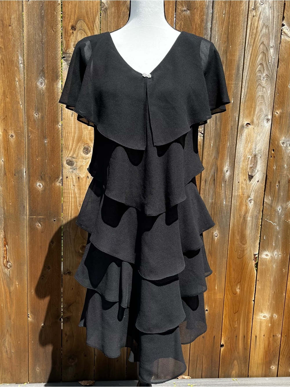 Vintage Patra Black Tiered Ruffle V-Neck Dress with rhinestone bow